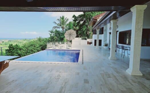 8-BR ocean view villa sitting on a hill