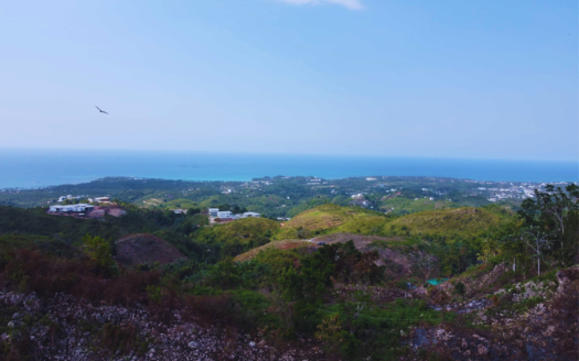 Great ocean view lot in authentic self-sufficient community