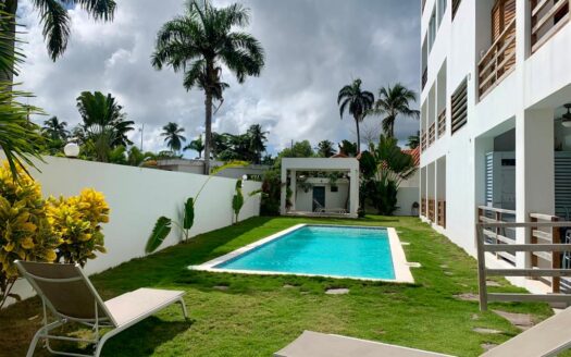 2-BR condo with private rooftop steps to the beach