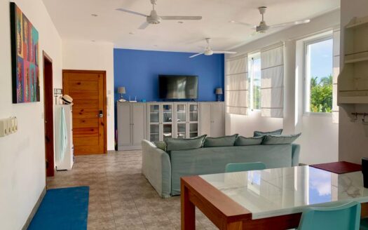 2-BR condo with private rooftop steps to the beach