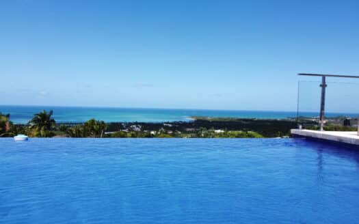 8-BR ocean view villa sitting on a hill