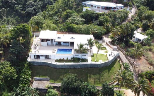 8-BR ocean view villa sitting on a hill