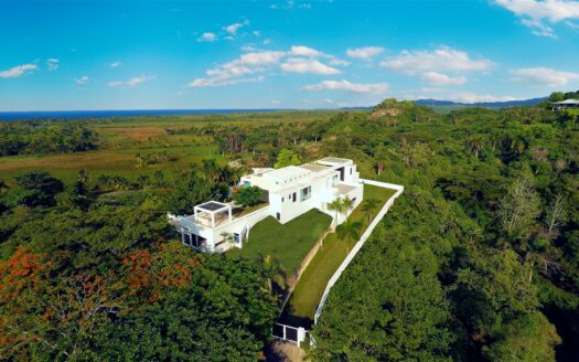 Modern villa on small hill with ocean view