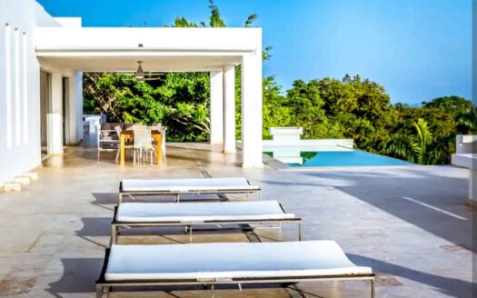 Modern villa on small hill with ocean view