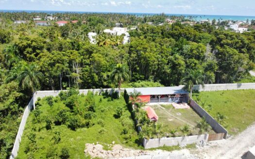 Flat lot perfect to build your future home steps from the beach