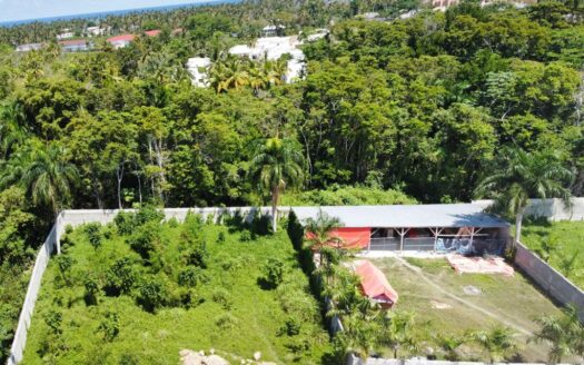 Flat lot perfect to build your future home steps from the beach