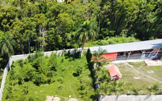 Flat lot perfect to build your future home steps from the beach