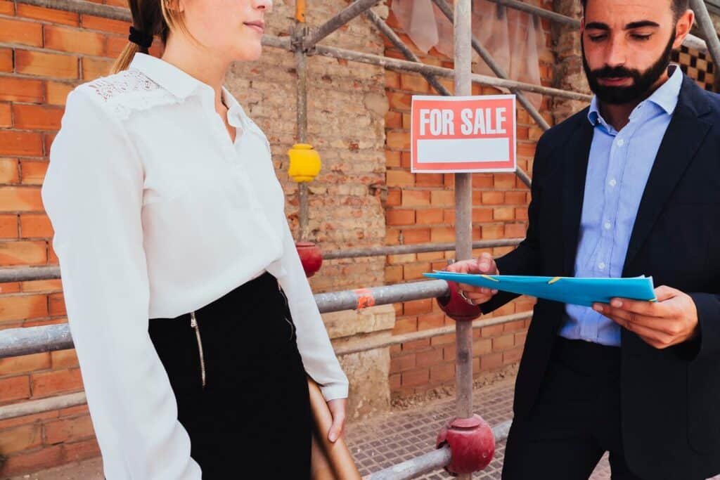 Foreign investor reviewing real estate contract to avoid legal issues in the Dominican Republic