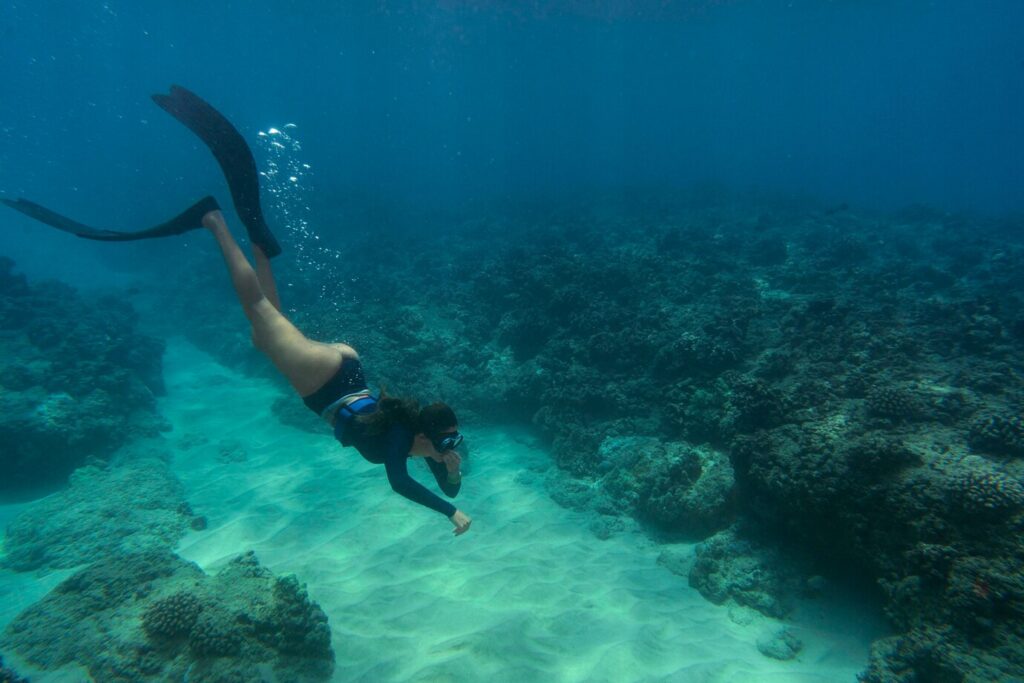 Scuba diver investigating the St. George shipwreck near Bayahibe, Dominican Republic