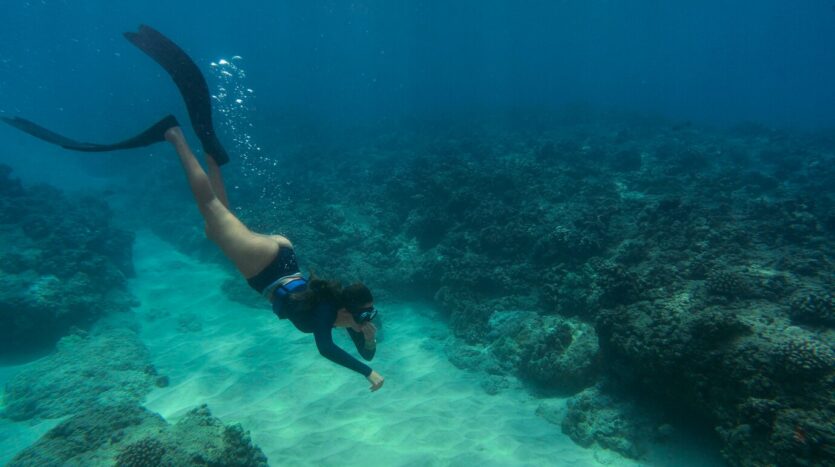 Scuba diver investigating the St. George shipwreck near Bayahibe, Dominican Republic