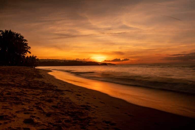 Stunning sunrise over the ocean in the Dominican Republic, offering breathtaking views of the coast.