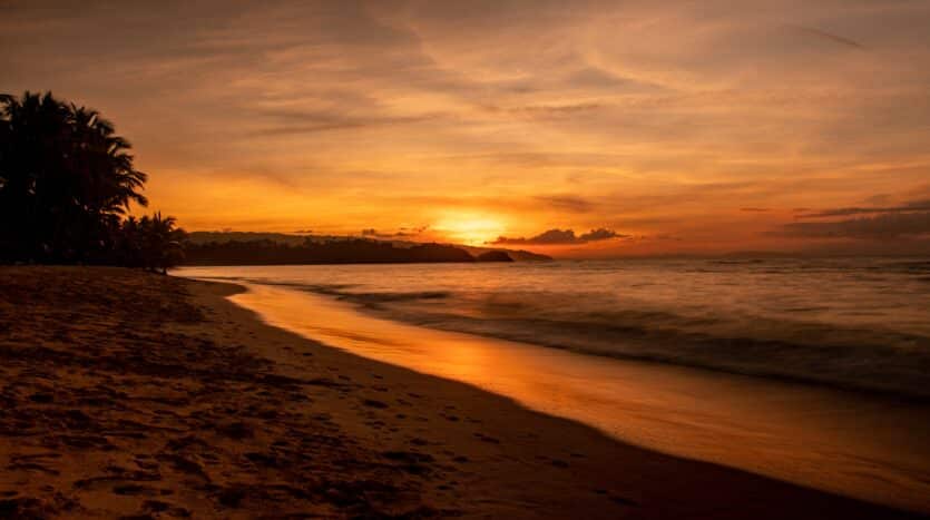Stunning sunrise over the ocean in the Dominican Republic, offering breathtaking views of the coast.
