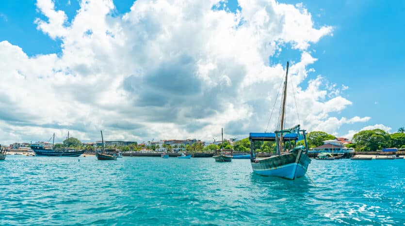 Tourists boarding a rental boat at a marina in Samaná, Dominican Republic.