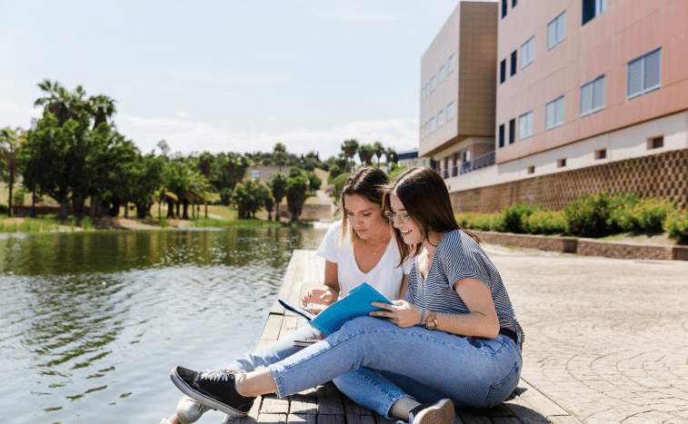 University students walking through a campus in the Dominican Republic.