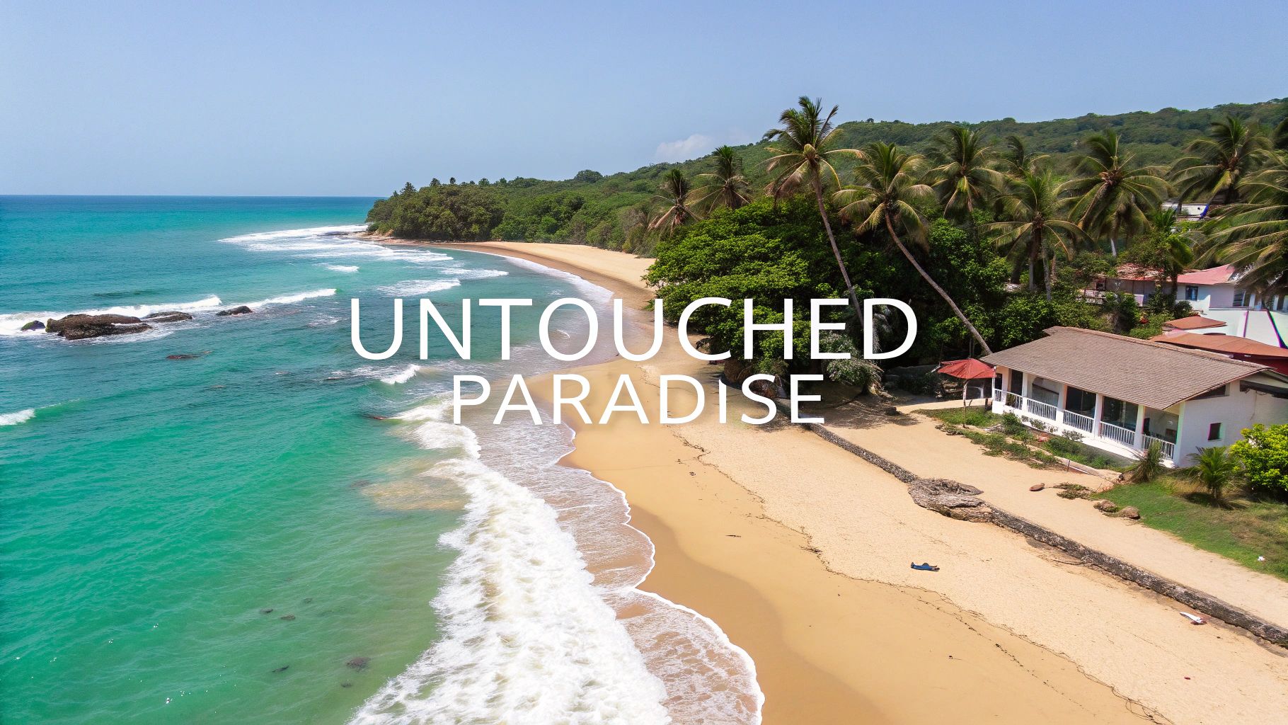 Aerial view of a serene tropical beach with clear blue ocean, white waves, lush palm trees, and coastal buildings.