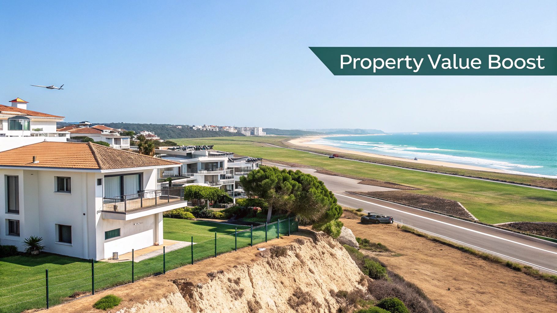 Luxury houses overlooking a beautiful ocean beach with a plane flying overhead and a 'Property Value Boost' banner.